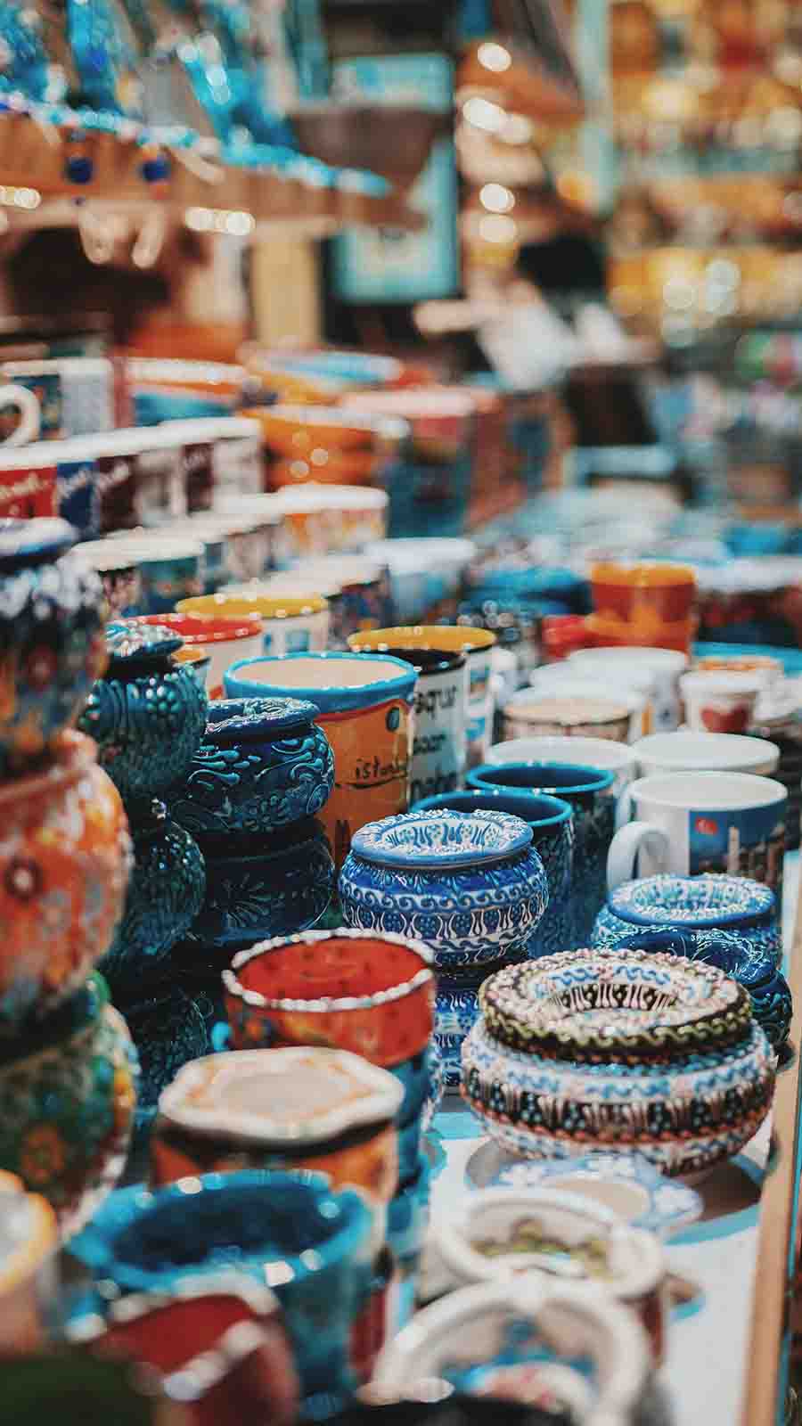 handmade bowls that are being sold at a vendors table